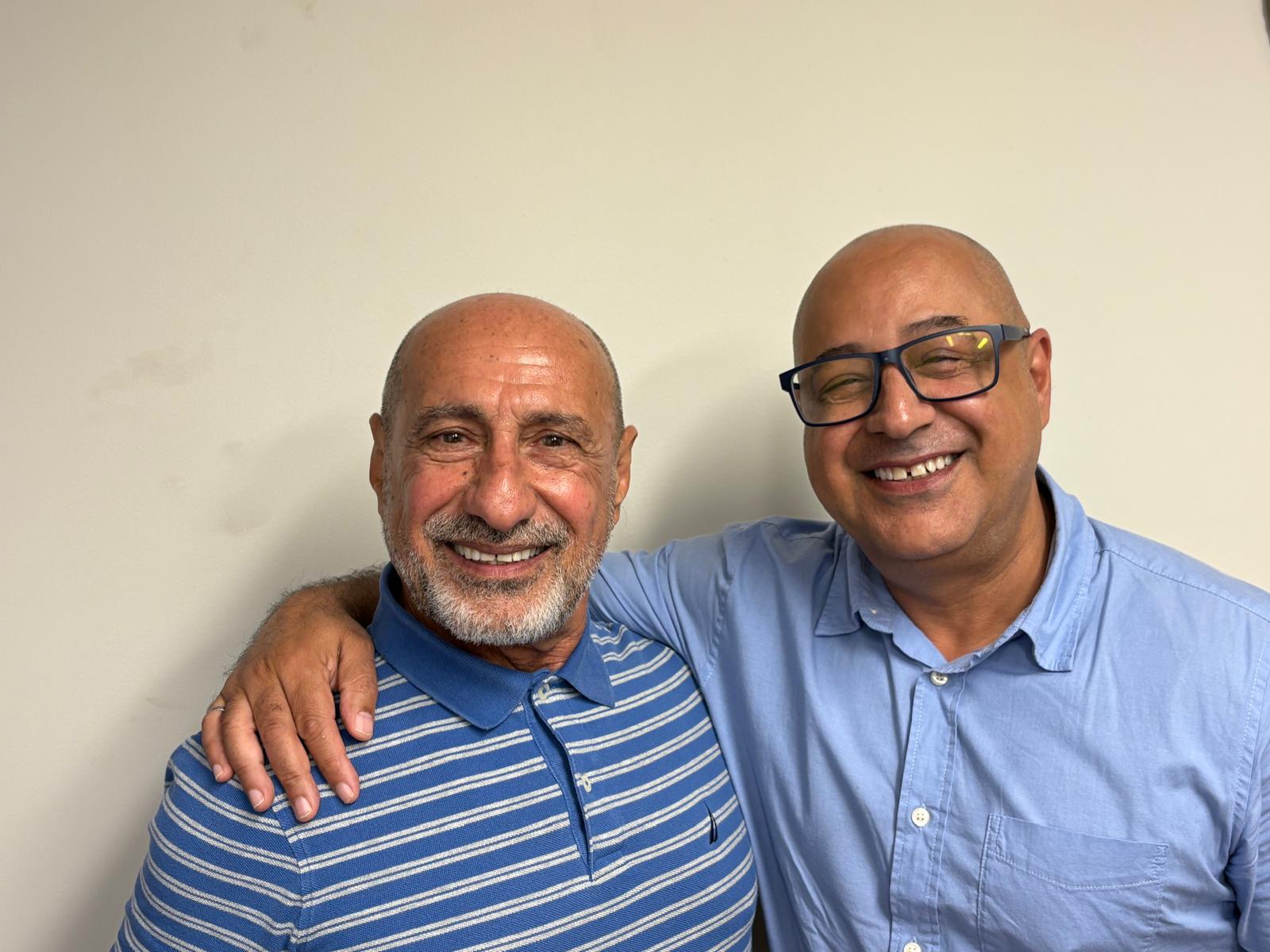 Sam Sami and Eric Sami smiling together, leaders of AARYA Construction and Design Inc.